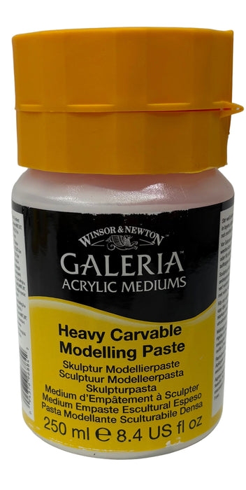 Bottle of Winsor & Newton Galeria Heavy Carvable Modeling Paste with yellow cap on a white background